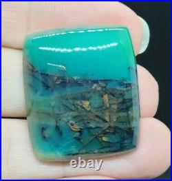 Indonesian Blue Opalized Petrified Wood with Copper Cabochon